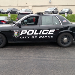 See the waving flag decal on this Wayne city police car?